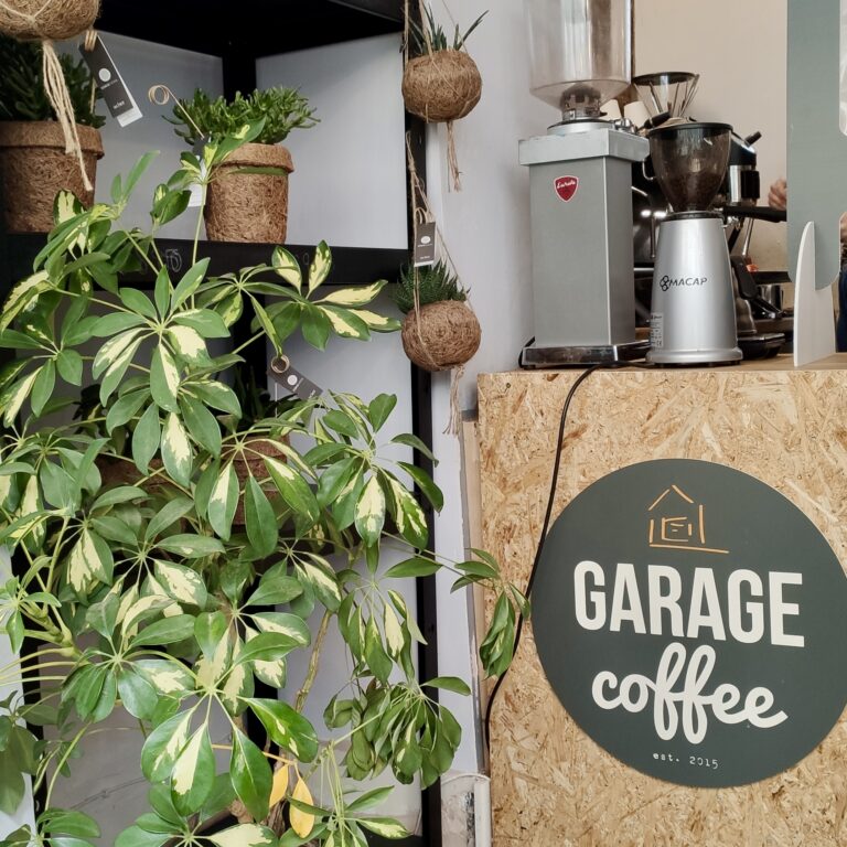 Garage Coffee interior with plants