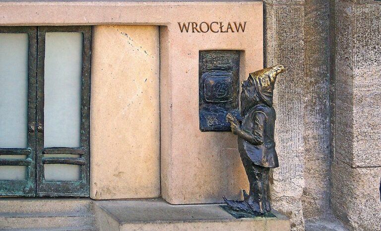 A Wroclaw Dwarf Figure removes cash from a bank