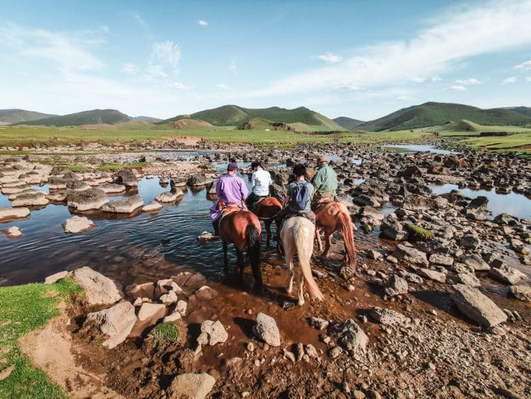 Riding horses in Orkhon Valley, Central Mongolia